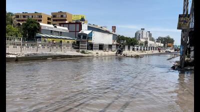 Residents are unable to go outdoors due to waterlogged and severely damaged Nirwana street in Kharar. (HT Photo) Residents are unable to go outdoors due to waterlogged and severely damaged Nirwana street in Kharar. (HT Photo)