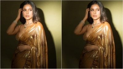 Assisted by celebrity fashion stylist Saachi Vijaywargia, Shehnaaz accessorised her saree with a stunning array of diamond and emerald jewellery, including a double-string necklace, a bracelet, rings and elegant dangling earrings. (Instagram/@Shehnaaz Gill) Assisted by celebrity fashion stylist Saachi Vijaywargia, Shehnaaz accessorised her saree with a stunning array of diamond and emerald jewellery, including a double-string necklace, a bracelet, rings and elegant dangling earrings. (Instagram/@Shehnaaz Gill)