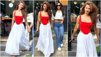 Disha Patani is here to give some chic summer fashion inspiration. Her latest look features a bright red corset top that she paired with a white long maxi skirt. With minimal makeup, open tresses, flats and a shoulder bag, she looked effortlessly stylish. (HT photo/VarunderChawla) Disha Patani is here to give some chic summer fashion inspiration. Her latest look features a bright red corset top that she paired with a white long maxi skirt. With minimal makeup, open tresses, flats and a shoulder bag, she looked effortlessly stylish. (HT photo/VarunderChawla)