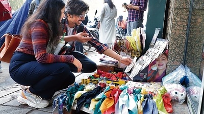Students of Delhi University are hunting for aesthetic bands to gift to their friends on Forgiveness Day at shops around the campus, (Photo: Shantanu Bhattacharya/HT (Photo for representational purposes only)))