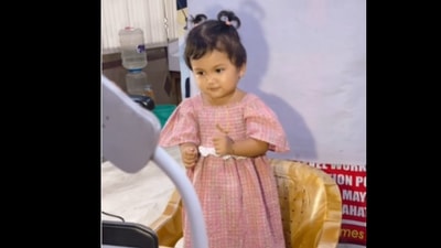 Snapshot of the girl posing for her Aadhaar card picture.
