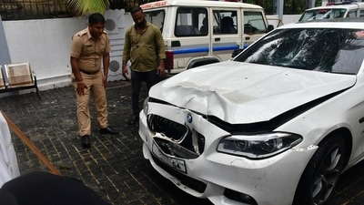 Worli hit and run case: Police official inspecting the BMW car involved in the accident at parking stand of Worli police station, in Mumbai on Sunday, 07 July 2024. (Photo by Bhushan Koyande) (HT Photo)