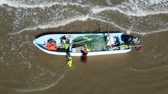 A drone view shows fishermen as tropical storm Beryl continues to move through the Gulf of Mexico, in Playa Bagdad, Mexico July 6, 2024. REUTERS/Daniel Becerril(REUTERS)