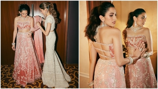 Shloka wore a peach-coloured lehenga set designed by Manish Malhotra during the sangeet ceremony. The ensemble is inspired by Kareena Kapoor's blouse and palazzo pants set she wore for Bole Chudiyan in Kabhi Khushi Kabhie Gham. It features a backless one-shoulder blouse, an A-line lehenga skirt, and a dupatta. (Instagram)