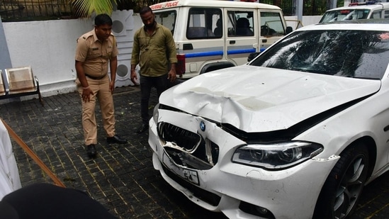 Worli hit and run case: Police official inspecting the BMW car involved in the accident at parking stand of Worli police station, in Mumbai on Sunday, 07 July 2024. (Photo by Bhushan Koyande)(HT Photo)