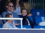 Britain's Prince George, right, reacts as he watches the play with his father Prince William .(AP) Britain's Prince George, right, reacts as he watches the play with his father Prince William .(AP)