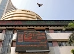 Stock market today: A bird flies past a screen displaying the Sensex results on the facade of the Bombay Stock Exchange (BSE) building in Mumbai.