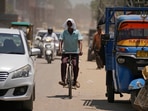 FILE- A man covers his face with a cloth to shield from the heat in Jammu, India, Monday, May 20, 2024. A monthslong heatwave across swathes of India has killed more than 100 people and led to over 40,000 suspected cases of heat stroke in the last three and a half months, a Health Ministry official said Thursday, June 20. (AP Photo/Channi Anand) FILE- A man covers his face with a cloth to shield from the heat in Jammu, India, Monday, May 20, 2024. A monthslong heatwave across swathes of India has killed more than 100 people and led to over 40,000 suspected cases of heat stroke in the last three and a half months, a Health Ministry official said Thursday, June 20. (AP Photo/Channi Anand)