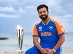 Indian captain Rohit Sharma poses with the 2024 ICC Men's T20 World Cup trophy(PTI) Indian captain Rohit Sharma poses with the 2024 ICC Men's T20 World Cup trophy(PTI)