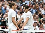 Taylor Fritz (R) speaks with Germany's Alexander Zverev at the end of their men's singles tennis match (AFP) Taylor Fritz (R) speaks with Germany's Alexander Zverev at the end of their men's singles tennis match (AFP)