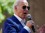 Concerns grow as Joe Biden sits in trance at Philly church after pastor told everyone to stand up (REUTERS/Nathan Howard)