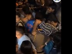 A Mumbai Police constable helped the woman and took her away from the crowd at the victory parade. A Mumbai Police constable helped the woman and took her away from the crowd at the victory parade.