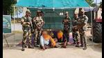 BSF personnel with the accused in Ferozepur. (HT photo) BSF personnel with the accused in Ferozepur. (HT photo)