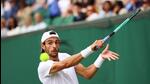 Italy's Lorenzo Musetti returns the ball to France's Giovanni Mpetshi Perricard. (AFP) Italy's Lorenzo Musetti returns the ball to France's Giovanni Mpetshi Perricard. (AFP)