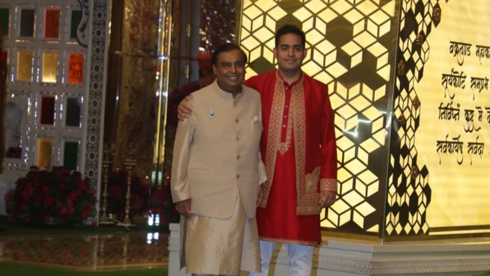 Akash Ambani puts his arm around papa Mukesh Ambani as they pose for paps at Anant Ambani, Radhika Merchant's haldi