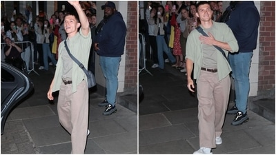Tom Holland, aka Spider-Man, delighted his fans as he was spotted wearing a green t-shirt paired with an open-button shirt and loose-fitted brown pants with a belt. Styled with white sneakers and a cross-body bag, he looked effortlessly stylish. (Instagram/@justjared) Tom Holland, aka Spider-Man, delighted his fans as he was spotted wearing a green t-shirt paired with an open-button shirt and loose-fitted brown pants with a belt. Styled with white sneakers and a cross-body bag, he looked effortlessly stylish. (Instagram/@justjared)