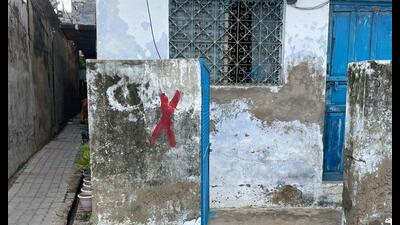 A team of government agencies on Monday reached Rahim Nagar to survey the area where they red-marked a few houses close to the catchment. (Sourced) A team of government agencies on Monday reached Rahim Nagar to survey the area where they red-marked a few houses close to the catchment. (Sourced)