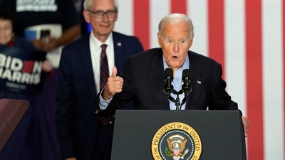 President Joe Biden speaks at a campaign rally at Sherman Middle School in Madison, Wis., Friday, July 5, 2024, as Wisconsin Gov. Tony Evers watches. (AP) President Joe Biden speaks at a campaign rally at Sherman Middle School in Madison, Wis., Friday, July 5, 2024, as Wisconsin Gov. Tony Evers watches. (AP)