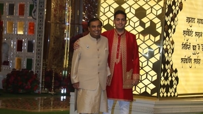 The image shows Akash Ambani with Mukesh Ambani at Anant Ambani and Radhika Merchant’s haldi. (Instagram/@varindertchawla) The image shows Akash Ambani with Mukesh Ambani at Anant Ambani and Radhika Merchant’s haldi. (Instagram/@varindertchawla)