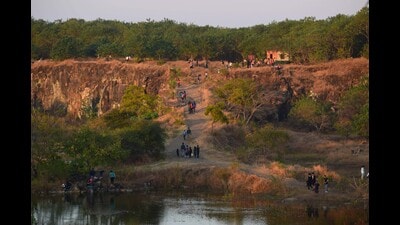 Moreover, the minors also entered the water body in the mining area. (HT PHOTO) Moreover, the minors also entered the water body in the mining area. (HT PHOTO)