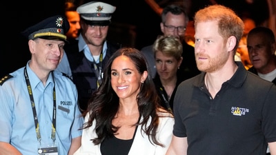 FILE - Britain's Prince Harry, right, and Meghan, Duchess of Sussex, arrive to a wheelchair basketball match at the Invictus Games in Duesseldorf, Germany, Sept. 13, 2023. Prince Harry and his wife, Meghan, will visit Nigeria in May 2024 for talks on the Invictus Games, which he founded to aid the rehabilitation of wounded and sick servicemembers and veterans, a Nigerian official said Sunday, April 28, 2024. (AP Photo/Martin Meissner, File) (AP) FILE - Britain's Prince Harry, right, and Meghan, Duchess of Sussex, arrive to a wheelchair basketball match at the Invictus Games in Duesseldorf, Germany, Sept. 13, 2023. Prince Harry and his wife, Meghan, will visit Nigeria in May 2024 for talks on the Invictus Games, which he founded to aid the rehabilitation of wounded and sick servicemembers and veterans, a Nigerian official said Sunday, April 28, 2024. (AP Photo/Martin Meissner, File) (AP)
