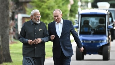 Prime Minister Narendra Modi and Russia's President Vladimir Putin walk during their meeting at the Novo-Ogaryovo state residence near Moscow, Russia July 8, 2024. (Reuters)