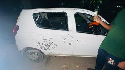 The bullet-riddled car after the clash in Batala. Around 50-60 gunshots were fired by both groups. The bullet-riddled car after the clash in Batala. Around 50-60 gunshots were fired by both groups.