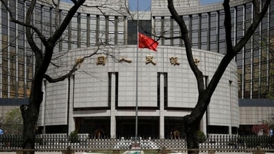The Chinese national flag at the headquarters of the People’s Bank of China, the central bank (PBOC). The Chinese national flag at the headquarters of the People’s Bank of China, the central bank (PBOC).