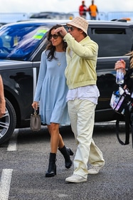 Ines de Ramon and Brad Pitt hold hands at the British Grand Prix. Ines de Ramon and Brad Pitt hold hands at the British Grand Prix.
