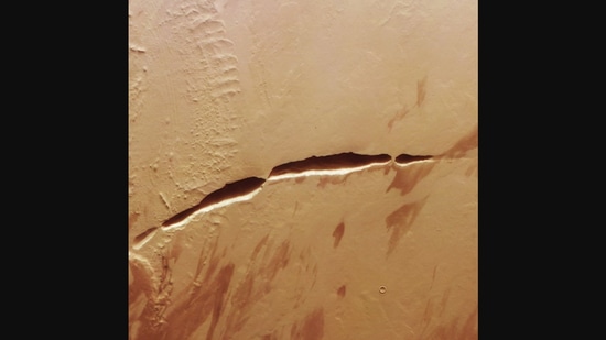 The image shows “scars of Mars”, posted by ESA on Instagram. 