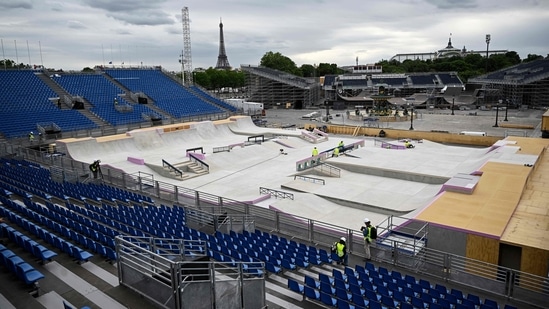 A general view shows workers carrying on works at the under construction skatepark for the upcoming Paris 2024 Olympics at La Concorde Urban Parc site in Paris on July 3, 2024.