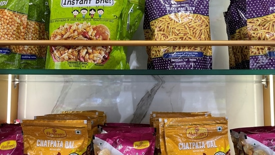 A view shows packets of snacks on the shelves inside a Haldiram's restaurant in Mumbai, India.