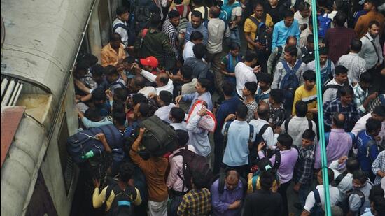 Thane, India - July 8, 2024: Due to heavy rains in Thane district, local services have been affected and as local trains are running late, there is a rush of passengers at Thane railway station on Monday morning, in Thane, Mumbai, India, Monday, July 8, 2024. (Praful Gangurde / HT Photo)