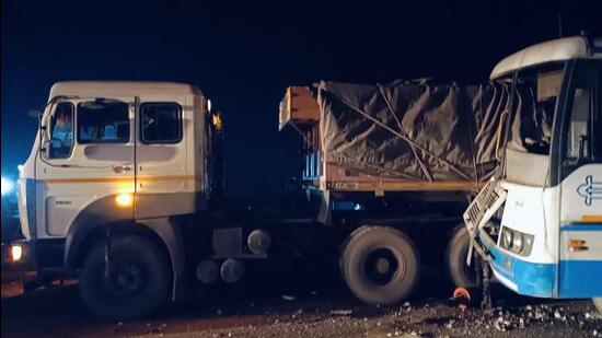 The damaged bus and trailer after the accident on Monday in Shahpura, Rajasthan. (HT Photo)