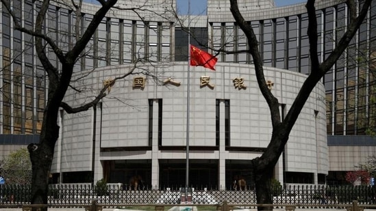 The Chinese national flag at the headquarters of the People’s Bank of China, the central bank (PBOC).