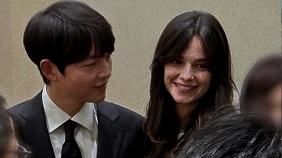 Song Joong Ki and wife at sister's wedding ceremony.