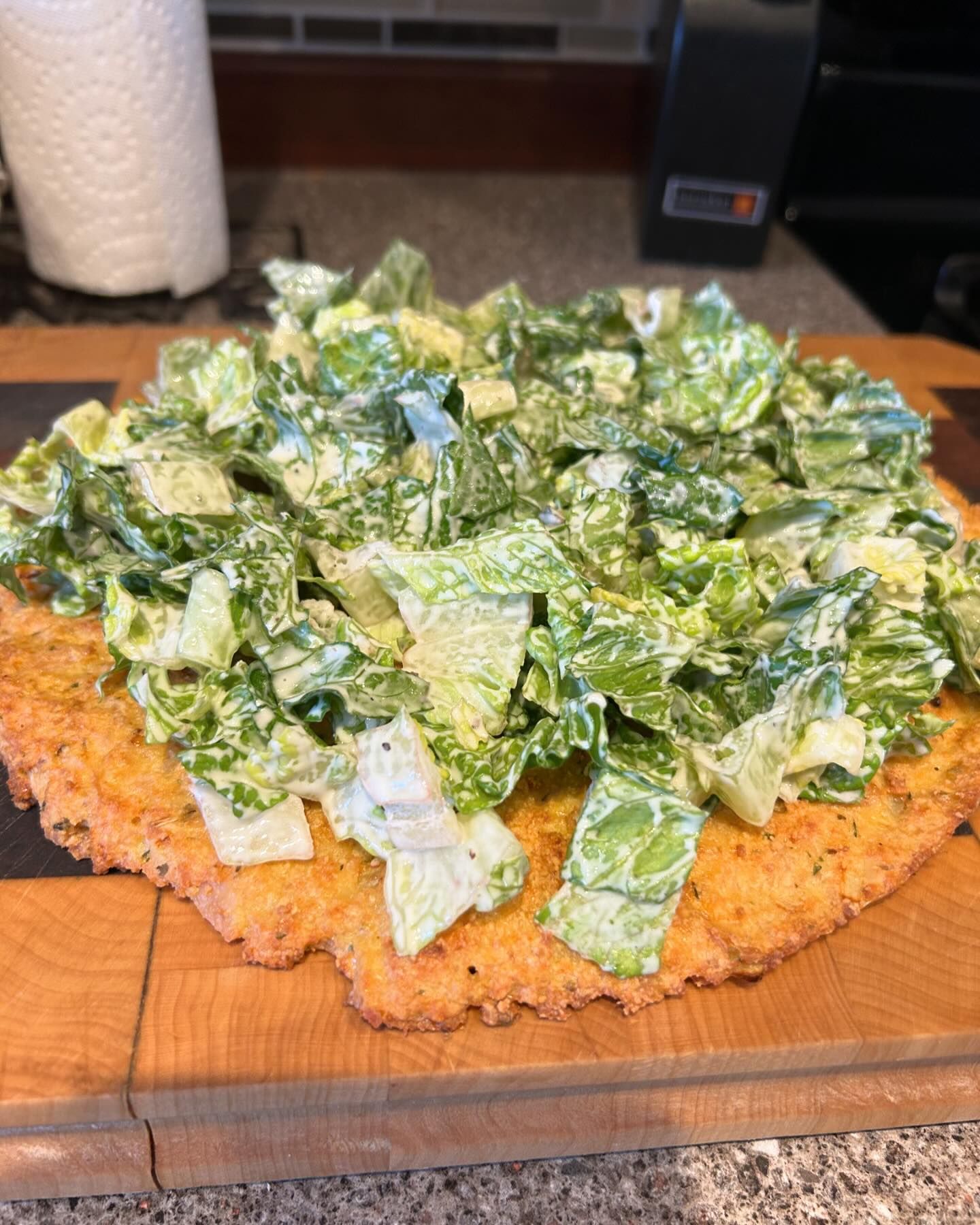 Caesar salad on a chicken pizza(Instagram) Caesar salad on a chicken pizza(Instagram)
