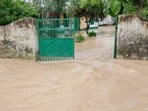 A primary school of Ran Nagar of Nighasan tehsil under floodwaters on Tuesday (HT) A primary school of Ran Nagar of Nighasan tehsil under floodwaters on Tuesday (HT)