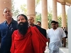 Baba Ramdev at the Supreme Court to attend the hearing relating to misleading advertisements by Patanjali Ayurved, in New Delhi..