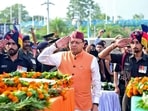 Dehradun, Jul 09 (ANI): Uttarakhand CM Pushkar Singh Dhami pays last respect to the mortal remains of the five soldiers of state who lost their lives in the Kathua terrorist attack, at Jolly Grant Airport in Dehradun on Tuesday. (ANI Photo) Dehradun, Jul 09 (ANI): Uttarakhand CM Pushkar Singh Dhami pays last respect to the mortal remains of the five soldiers of state who lost their lives in the Kathua terrorist attack, at Jolly Grant Airport in Dehradun on Tuesday. (ANI Photo)
