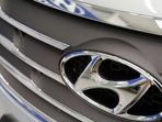 The logo of Hyundai Motor is seen on a car displayed at a Hyundai dealership in Seoul.