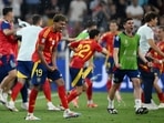 Spain's Lamine Yamal celebrates after the match.