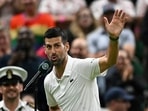 Winner Serbia's Novak Djokovic speaks during an interview and reacts to the behaviour of the crowd at the end of his Wimbledon singles match against Denmark's Holger Rune Winner Serbia's Novak Djokovic speaks during an interview and reacts to the behaviour of the crowd at the end of his Wimbledon singles match against Denmark's Holger Rune