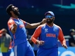 India's Jasprit Bumrah celebrates with teammate Rohit Sharma after Pakistan's Azam Khan was dismissed during the ICC men's Twenty20 World Cup 2024 group A cricket match between India and Pakistan India's Jasprit Bumrah celebrates with teammate Rohit Sharma after Pakistan's Azam Khan was dismissed during the ICC men's Twenty20 World Cup 2024 group A cricket match between India and Pakistan