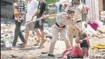 Mumbai, India - June 6, 2024: A few policemen from Powai police station injured in stone pelting when they went to assist the BMC officials during an anti-encroachment drive in Powai at Jai Bhim Nagar in Mumbai, India, on Thursday, June 6, 2024. (Photo by Satish Bate/ Hindustan Times) (Hindustan Times) Mumbai, India - June 6, 2024: A few policemen from Powai police station injured in stone pelting when they went to assist the BMC officials during an anti-encroachment drive in Powai at Jai Bhim Nagar in Mumbai, India, on Thursday, June 6, 2024. (Photo by Satish Bate/ Hindustan Times) (Hindustan Times)