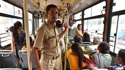 A bus marshal in action in 2019. (HT Archive) A bus marshal in action in 2019. (HT Archive)