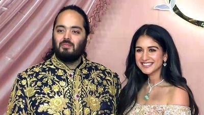 Mumbai: Reliance Industries Chairman Mukesh Ambani's son Anant Ambani and his fiancé Radhika Merchant pose for a photo during the sangeet ceremony ahead of their wedding at Jio World Centre. (ANI ) Mumbai: Reliance Industries Chairman Mukesh Ambani's son Anant Ambani and his fiancé Radhika Merchant pose for a photo during the sangeet ceremony ahead of their wedding at Jio World Centre. (ANI )