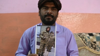 In this photo taken on February 22, 2024, Mohammed Imran shows his brother Mohammed Asfan image who was stranded in Russia along the war torn Ukraine border, at their home in Hyderabad. An apple farmer, an airline caterer and an out-of-work graduate are among the Indian nationals hired by Moscow, with the help of recruiters around the world, for the Russian Army in Ukraine. (AFP file) In this photo taken on February 22, 2024, Mohammed Imran shows his brother Mohammed Asfan image who was stranded in Russia along the war torn Ukraine border, at their home in Hyderabad. An apple farmer, an airline caterer and an out-of-work graduate are among the Indian nationals hired by Moscow, with the help of recruiters around the world, for the Russian Army in Ukraine. (AFP file)