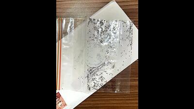 One of the letters, accompanied by a pouch containing a powdered substance suspected to be some sort of “explosive”, that was received at the Punjab BJP office in Chandigarh. (HT Photo)