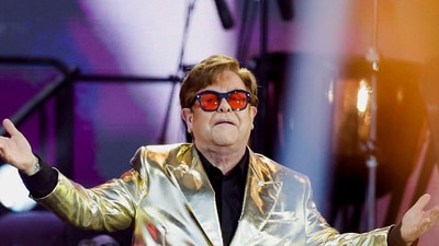 Elton John peed in a plastic bottle at a store in France. (Reuters)